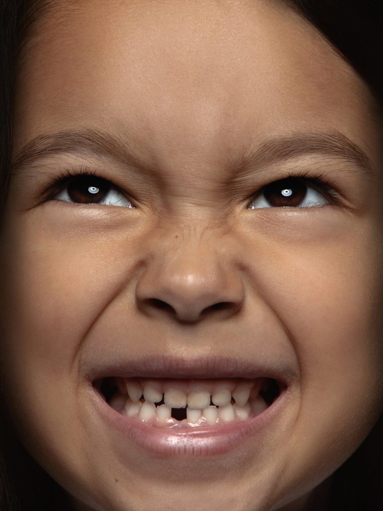 close up portrait little emotional asian girl